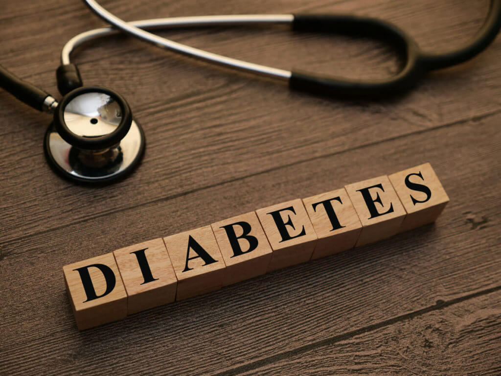 Diabetes, text words typography written with wooden letter.